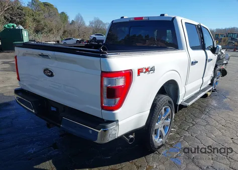 2023 Ford F-150 Lariat from USA, damaged, VIN 1FTFW1ED7PFD04587